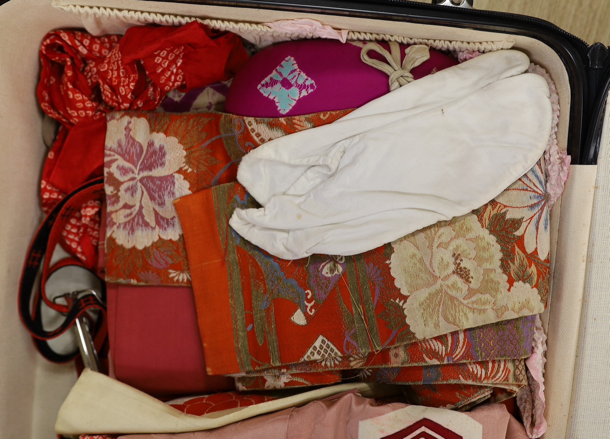 A quantity of Japanese clothing, kimonos, shoes etc
